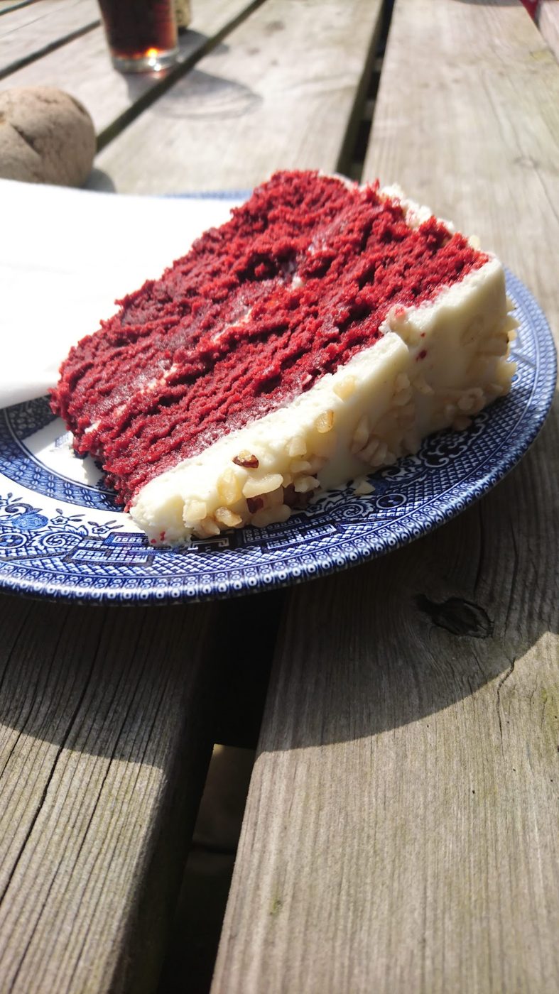 A slice of red velvet cake